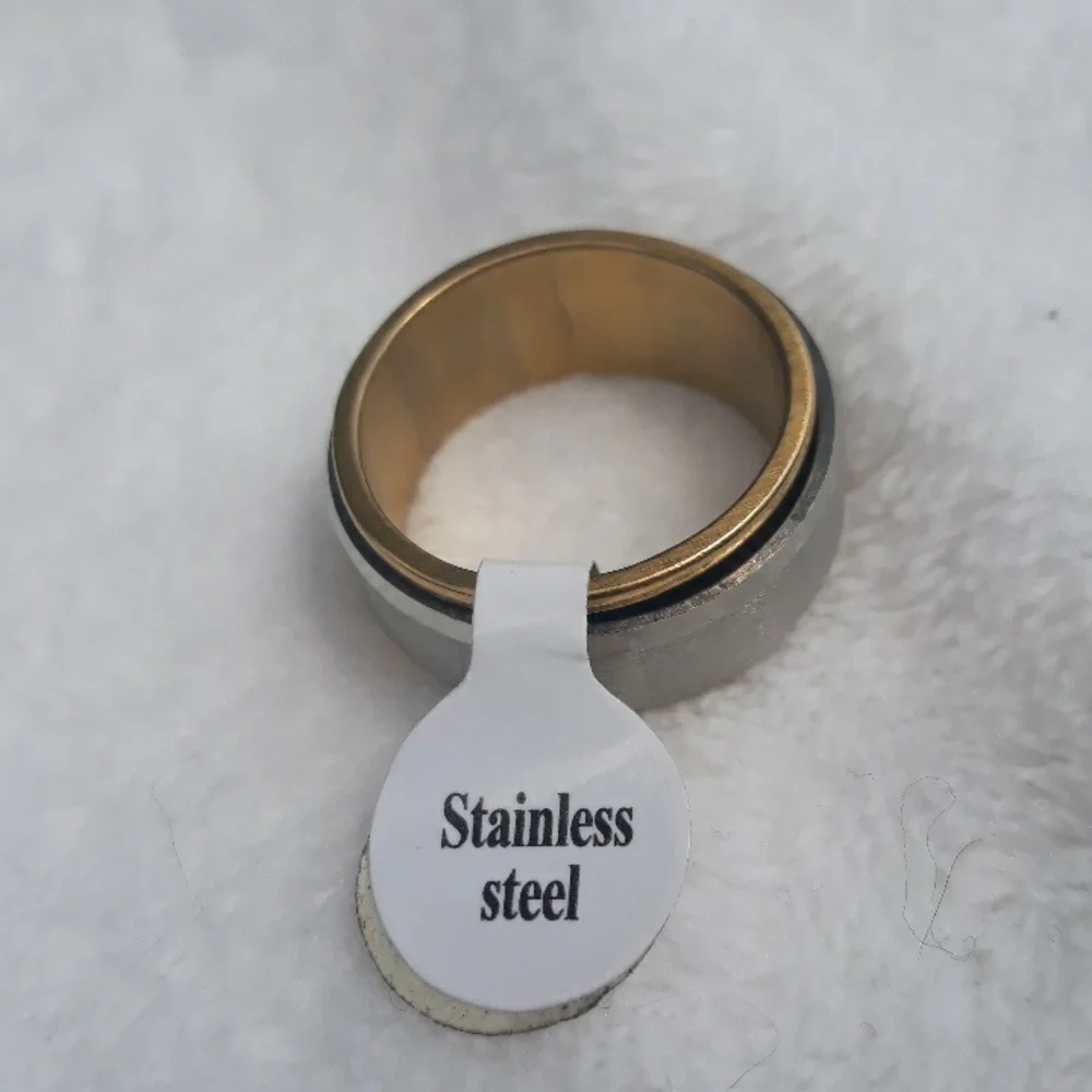 Gold and silver men's spinner ring. Size 10.5  or 19.6mm Great new condition